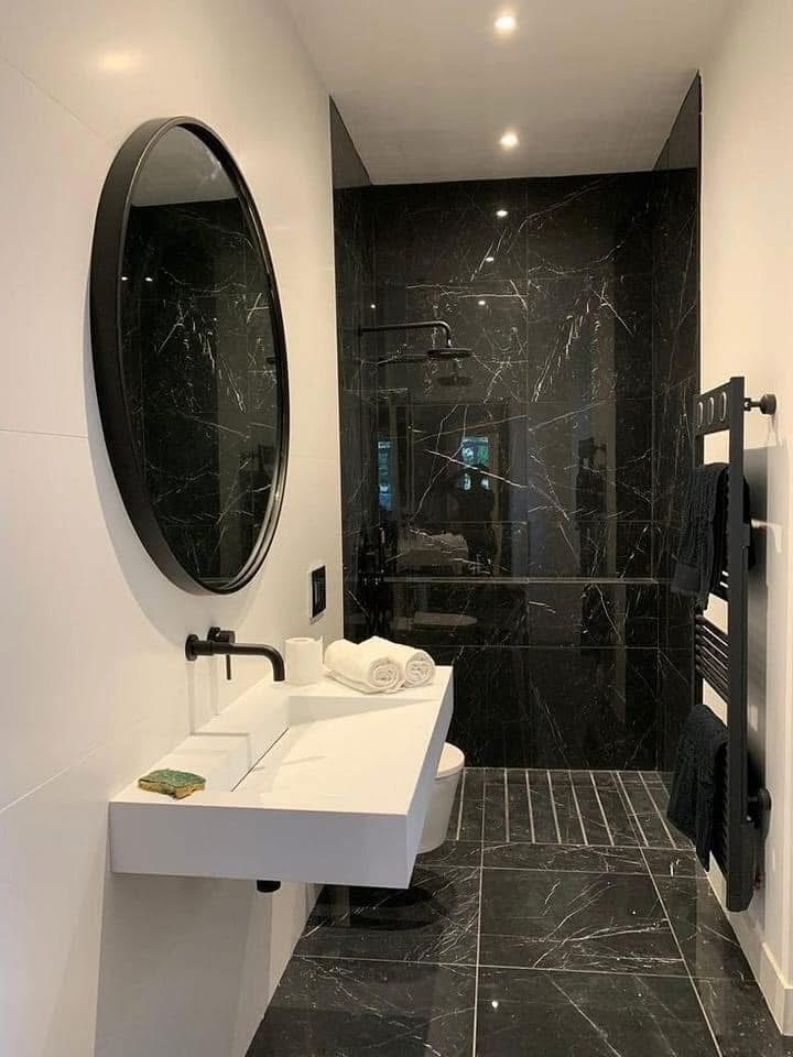 LUX RENOV — salle de bain marbre noir avec douche italienne et vasque suspendue