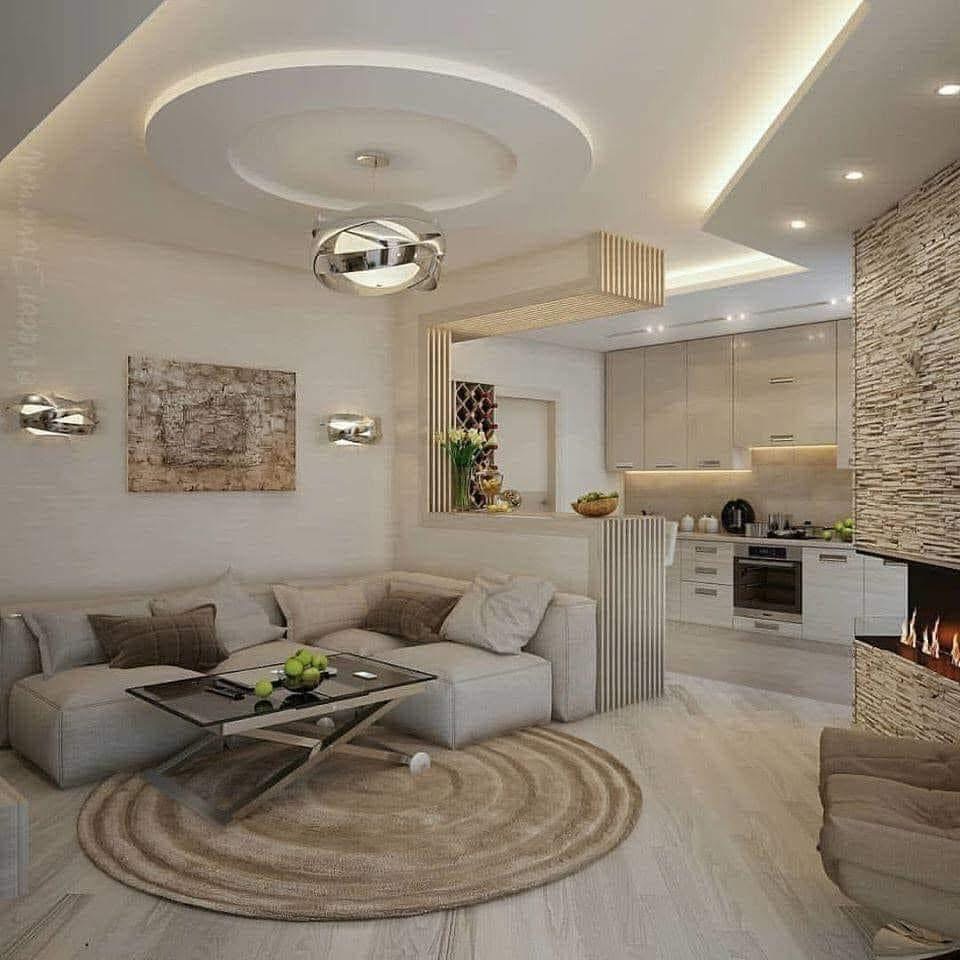LUX RENOV — salon contemporain avec faux plafond rond LED et cheminée pierre